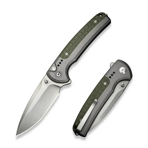 21,8 cm lång fällkniv med knivskaft av grå aluminium och en integrerad olivgrön backspacer av FRN och drop point-format knivblad med stentvättad finish av Nitro-V med en hårdhet på HRC 59-61. Clip, thumb stud och skruvar är tillverkade av rostfritt stål. Denna fällkniv är försedd med kullager vilket gör att den är mjuk, lätt, smidig och snabb att öppna. På knivens ände finns även en glaskross.Clip: Tip-Up Höger/Vänster